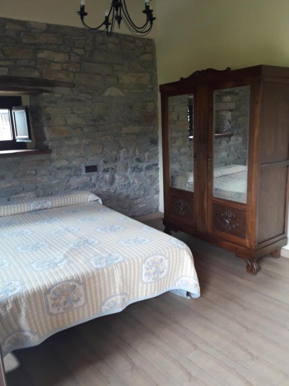 Postel nebo postele na pokoji v ubytování LAS CASINAS DE ARBAZAL