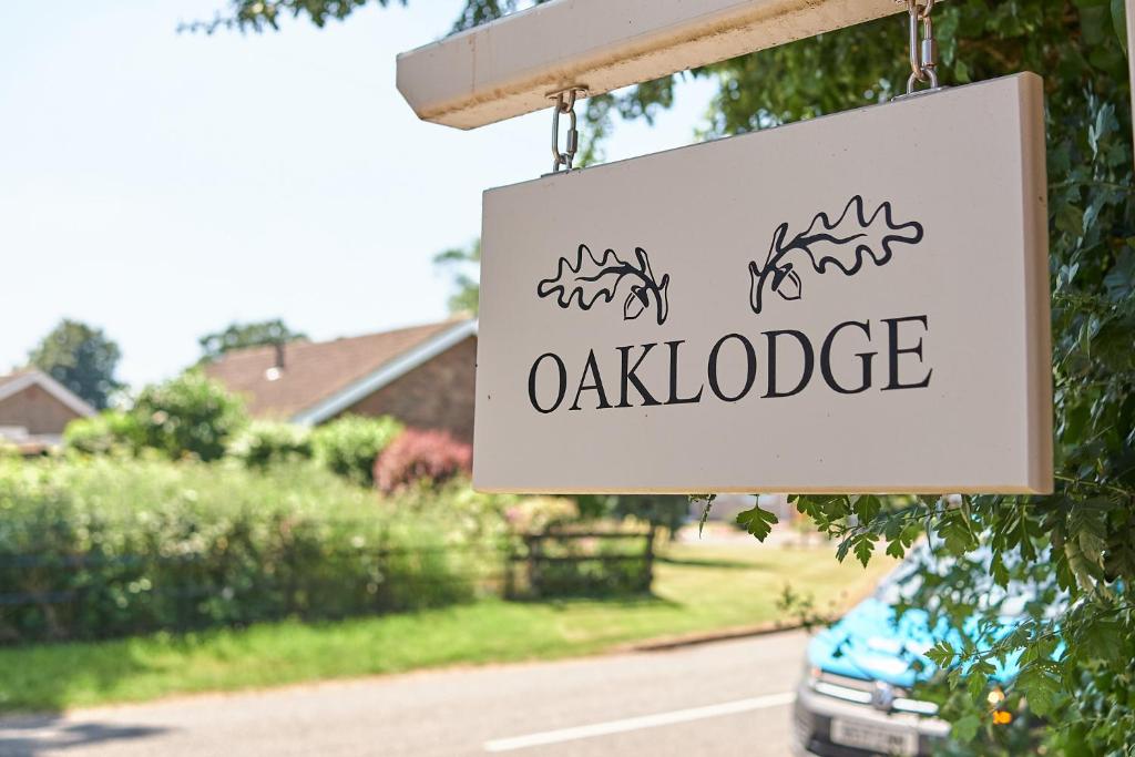 a sign that reads oakridge hanging in a driveway at Oaklodge in Spilsby