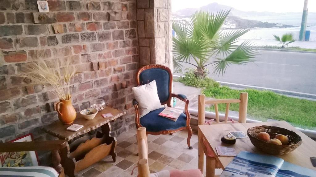 Posezení v ubytování Kauhuhu Casa Hotel