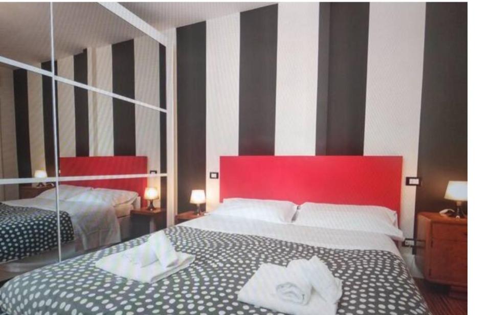 Postel nebo postele na pokoji v ubytování Milazzo apartment