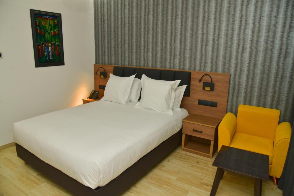 Postel nebo postele na pokoji v ubytování Surf One Hotel