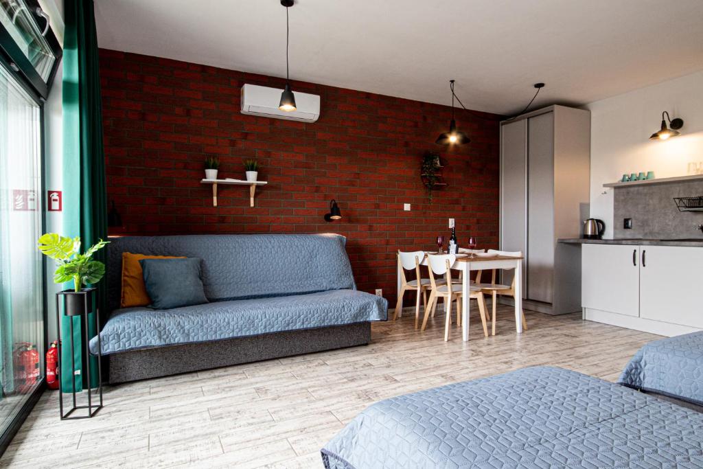 Kuchyň nebo kuchyňský kout v ubytování Domki i Apartamenty Al Mare