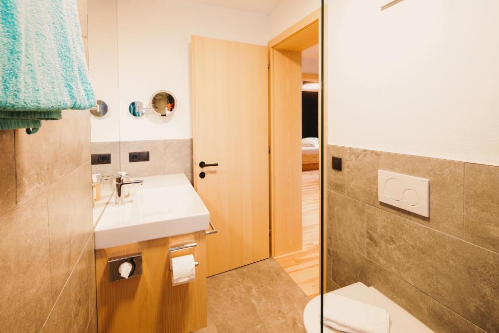 Kúpeľňa v ubytovaní Alpin - Studios & Suites