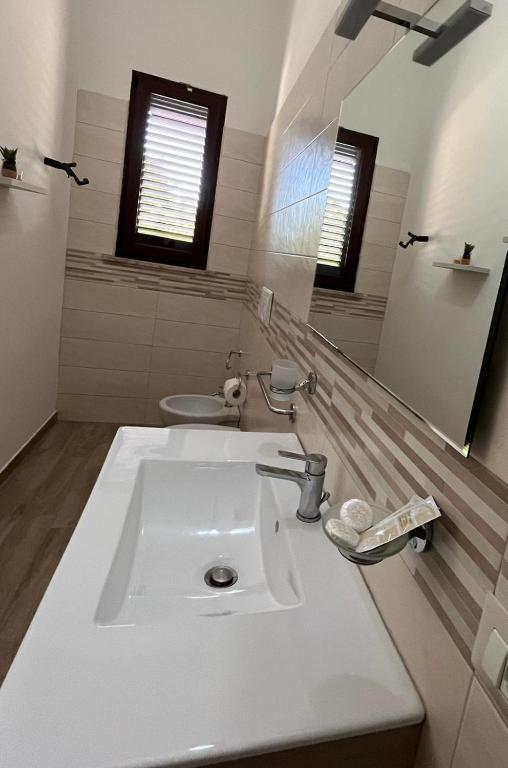 Koupelna v ubytování Krasì B&B