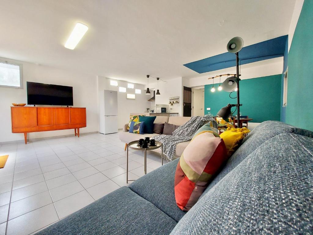 TV a/nebo společenská místnost v ubytování Casa Ana con Jardin