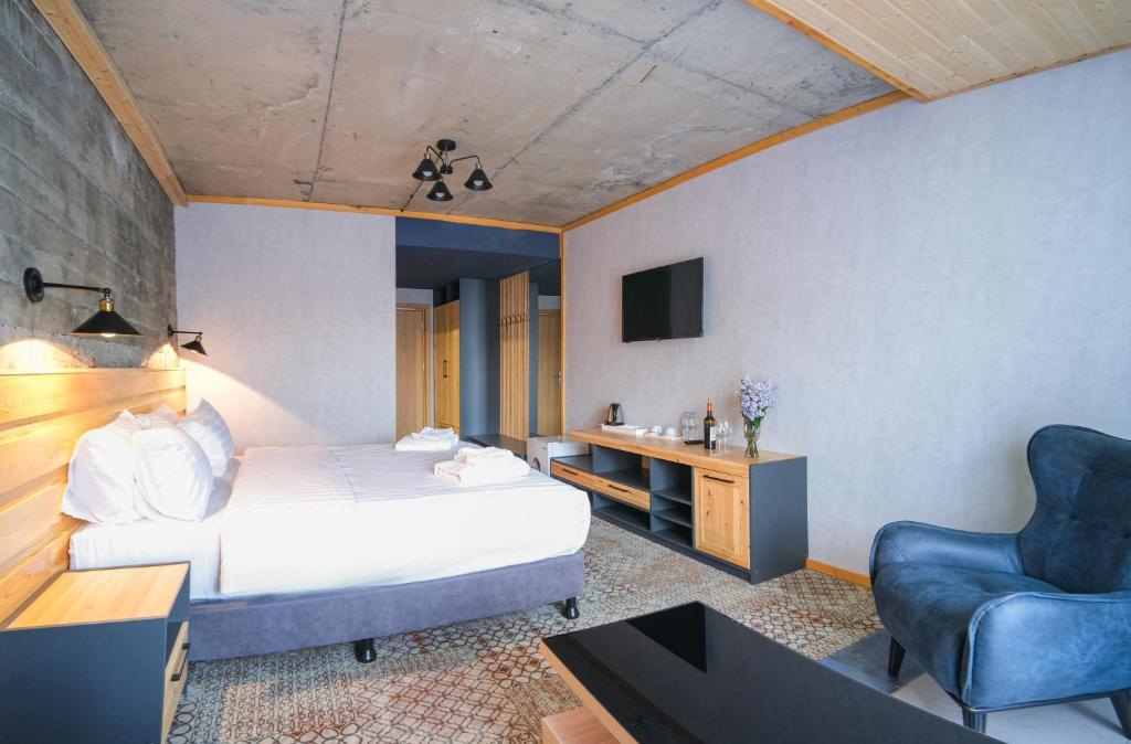 TV a/nebo společenská místnost v ubytování Hotel Posta
