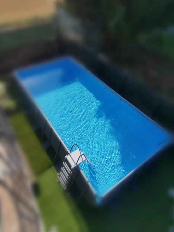 The swimming pool at or close to B&B Belli Dentro