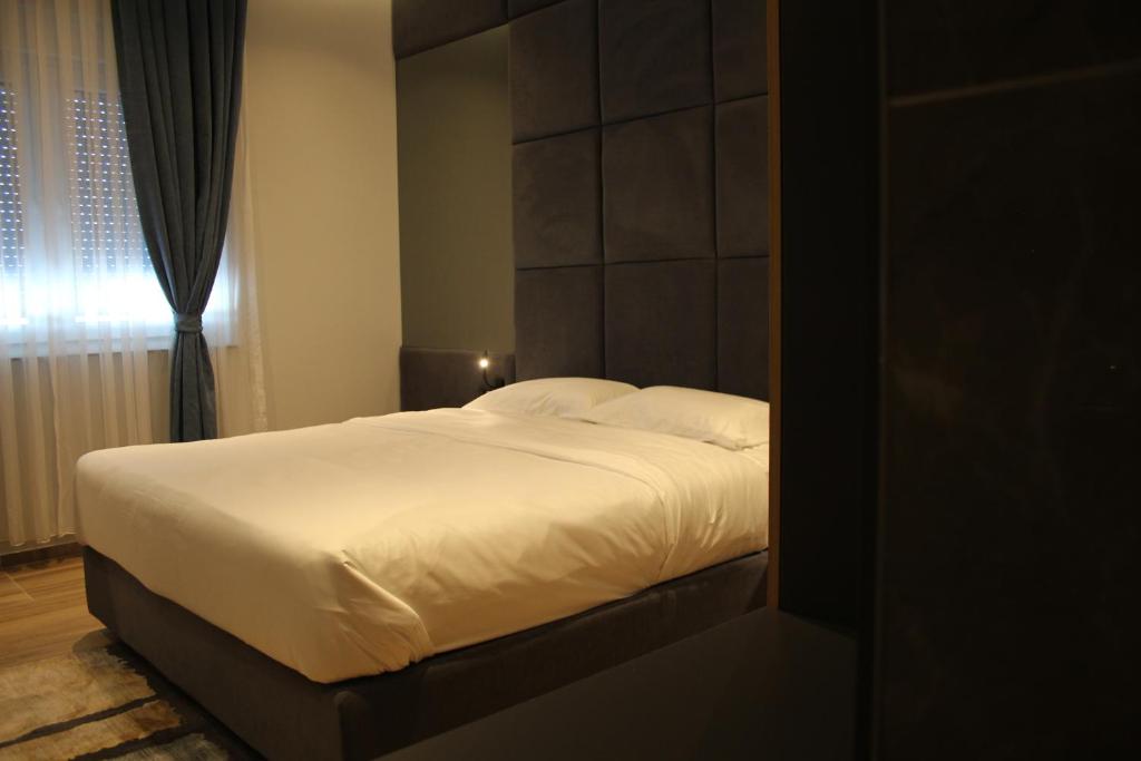 Postel nebo postele na pokoji v ubytování Hotel-VH