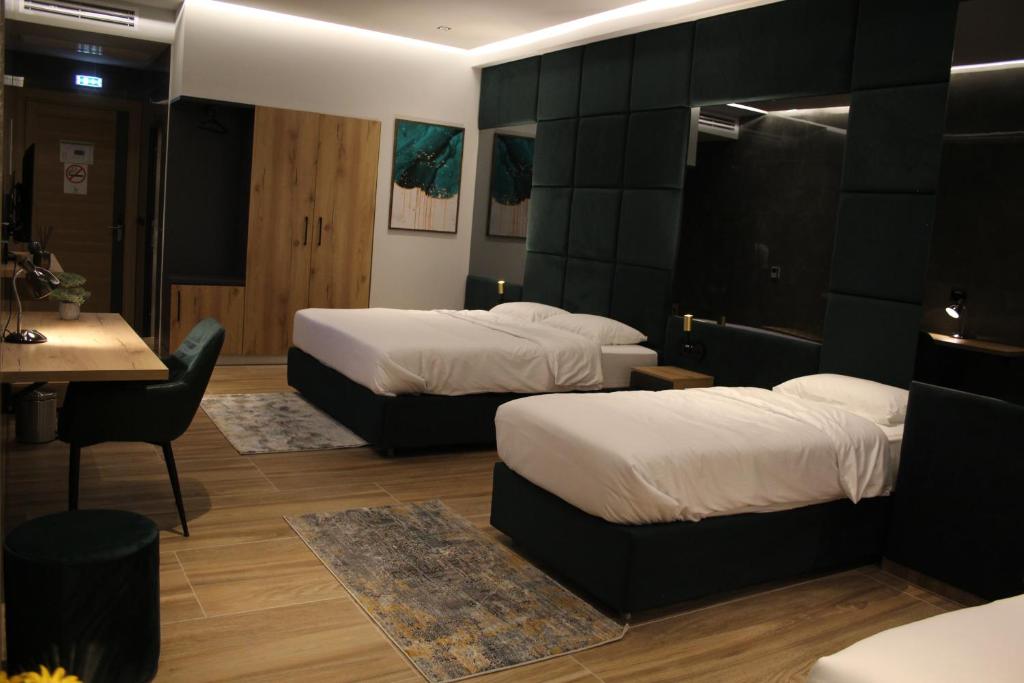 Postel nebo postele na pokoji v ubytování Hotel-VH