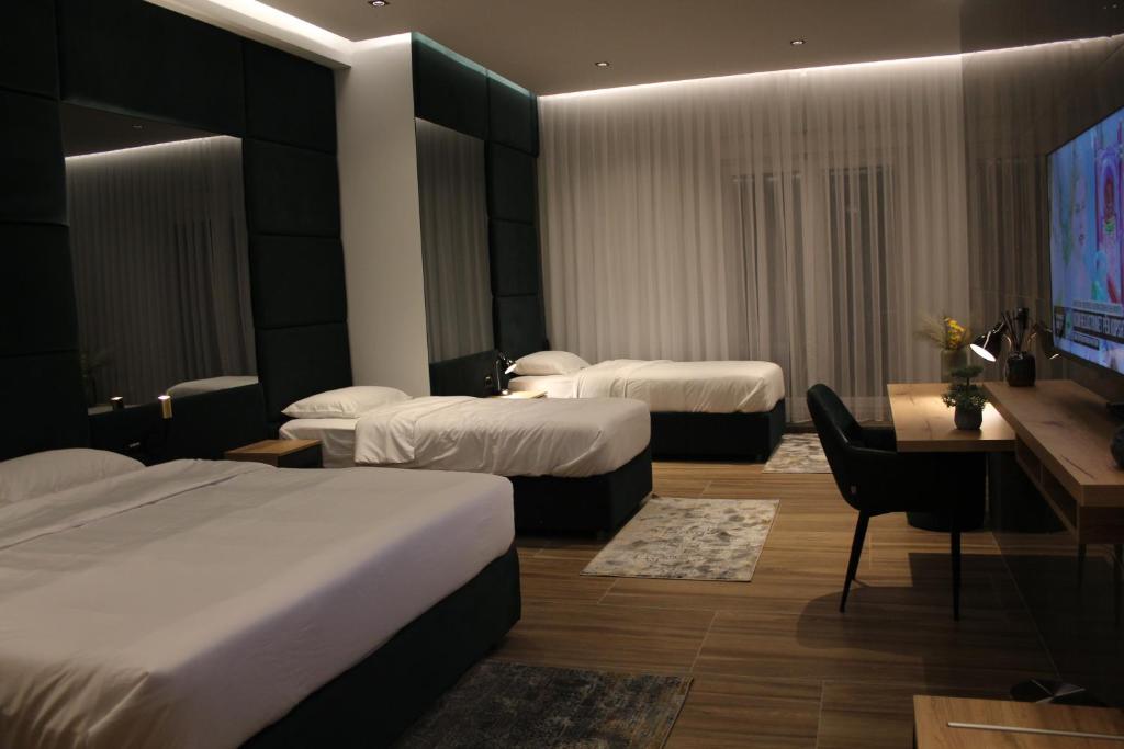 Postel nebo postele na pokoji v ubytování Hotel-VH