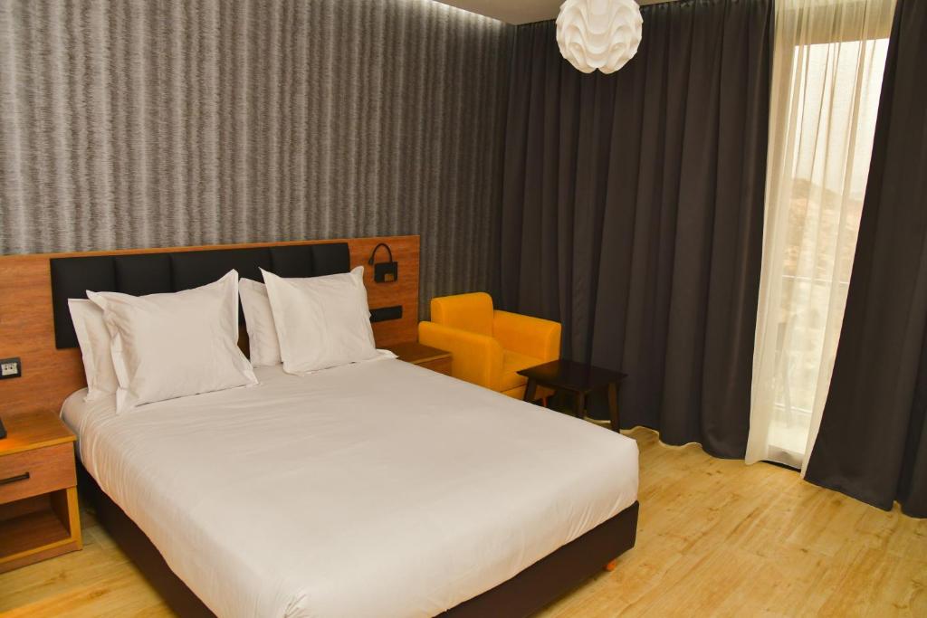 Postel nebo postele na pokoji v ubytování Surf One Hotel