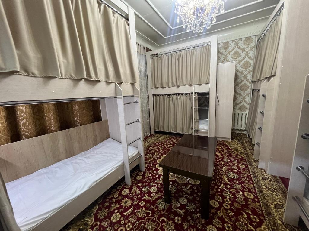 Postel nebo postele na pokoji v ubytování Bruce hostel