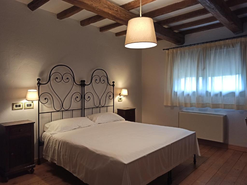 Letto o letti in una camera di Agrilocanda Val Campotto