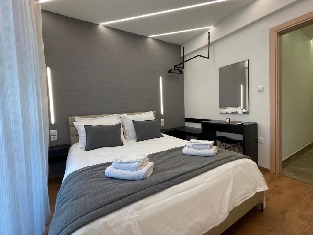 Posteľ alebo postele v izbe v ubytovaní EPaN Luxury Apartments