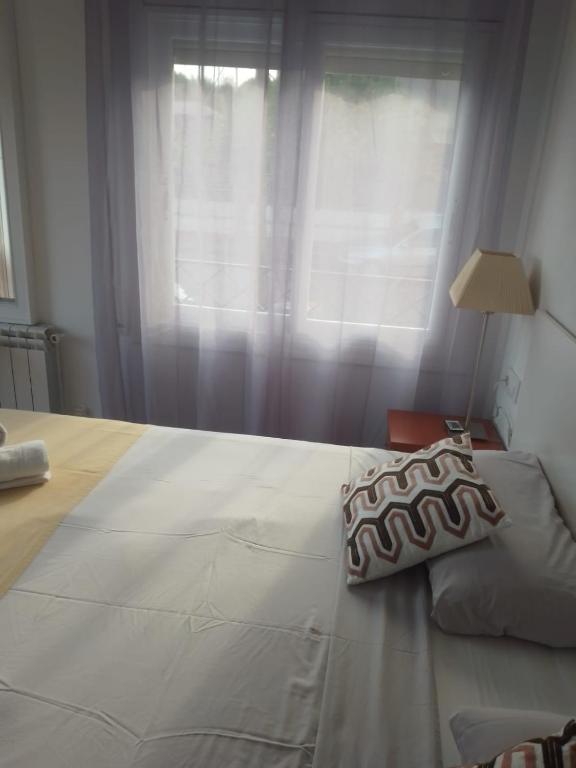 Posteľ alebo postele v izbe v ubytovaní Rooms Pineda