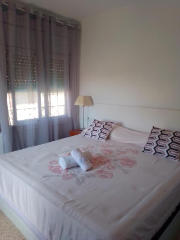 Posteľ alebo postele v izbe v ubytovaní Rooms Pineda