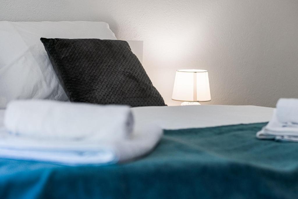 Posteľ alebo postele v izbe v ubytovaní Apartman ViEw