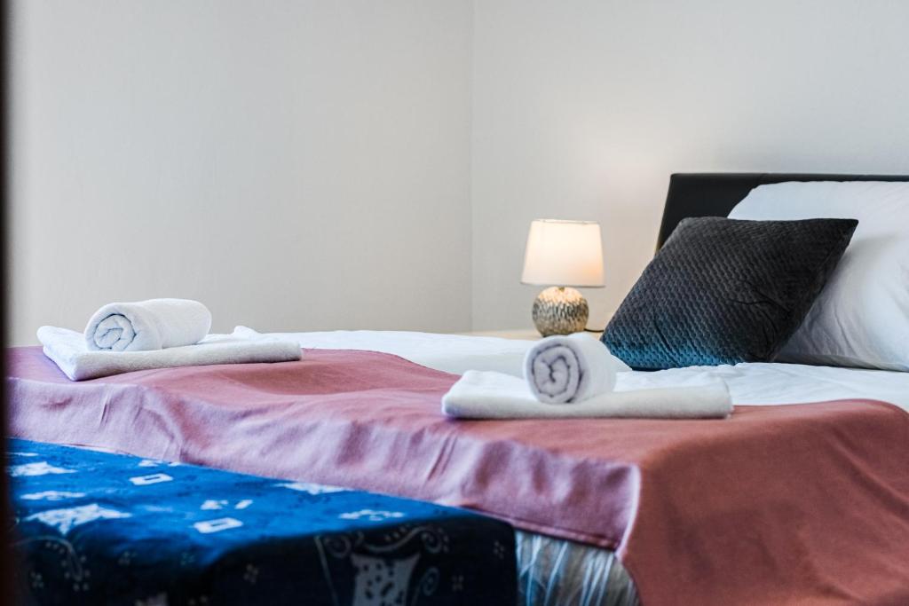 Posteľ alebo postele v izbe v ubytovaní Apartman ViEw