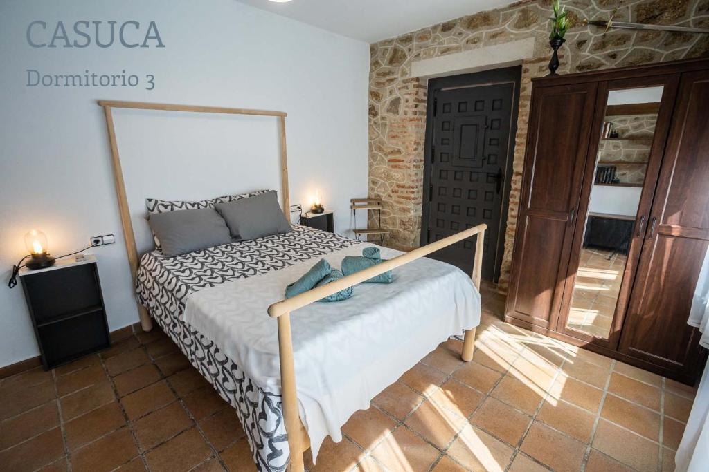 Posteľ alebo postele v izbe v ubytovaní Casa rural Paraje de Yuste
