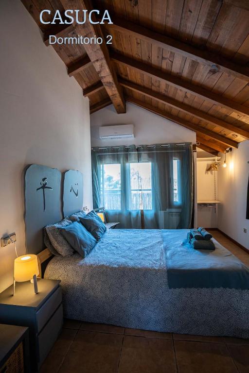 Posteľ alebo postele v izbe v ubytovaní Casa rural Paraje de Yuste
