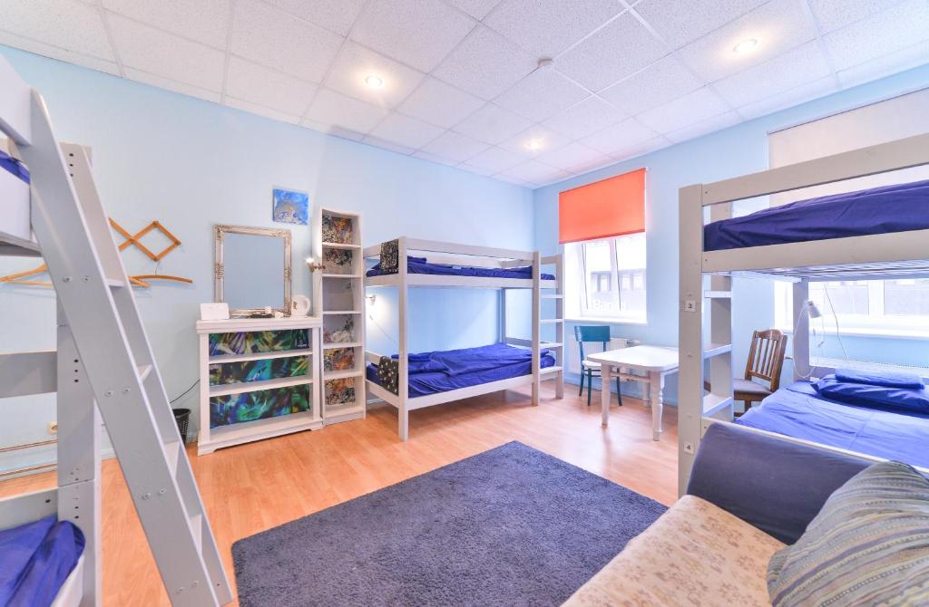 Postel nebo postele na pokoji v ubytování Central Hostel