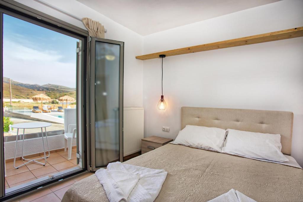 Posteľ alebo postele v izbe v ubytovaní Achilli Apartments