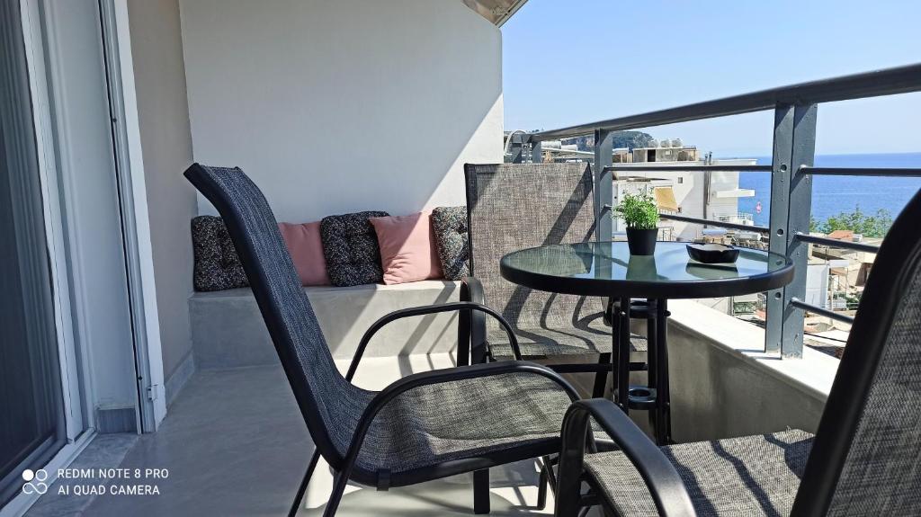 Uma varanda ou terraço em Bourbos Summer Rooms