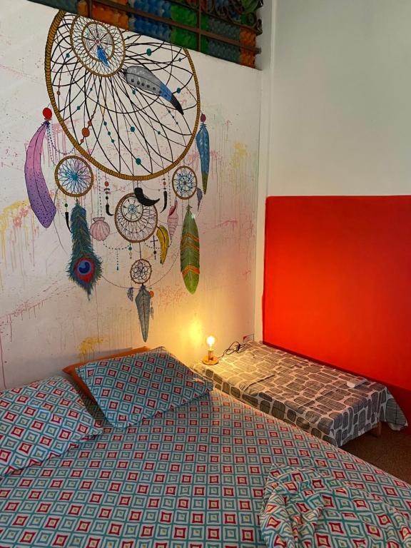 Postel nebo postele na pokoji v ubytování Zebulo Hostel