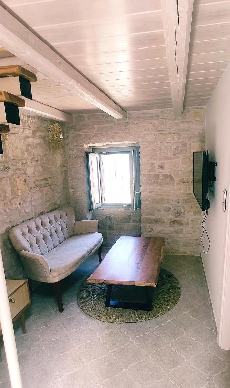 Postel nebo postele na pokoji v ubytování Studio Maya