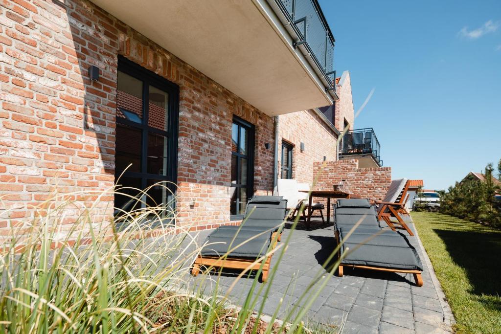 Fotografie z fotogalerie ubytování Küsten Suite Nord - direkte Wasserlage, Terrasse, 70qm v destinaci Greetsiel