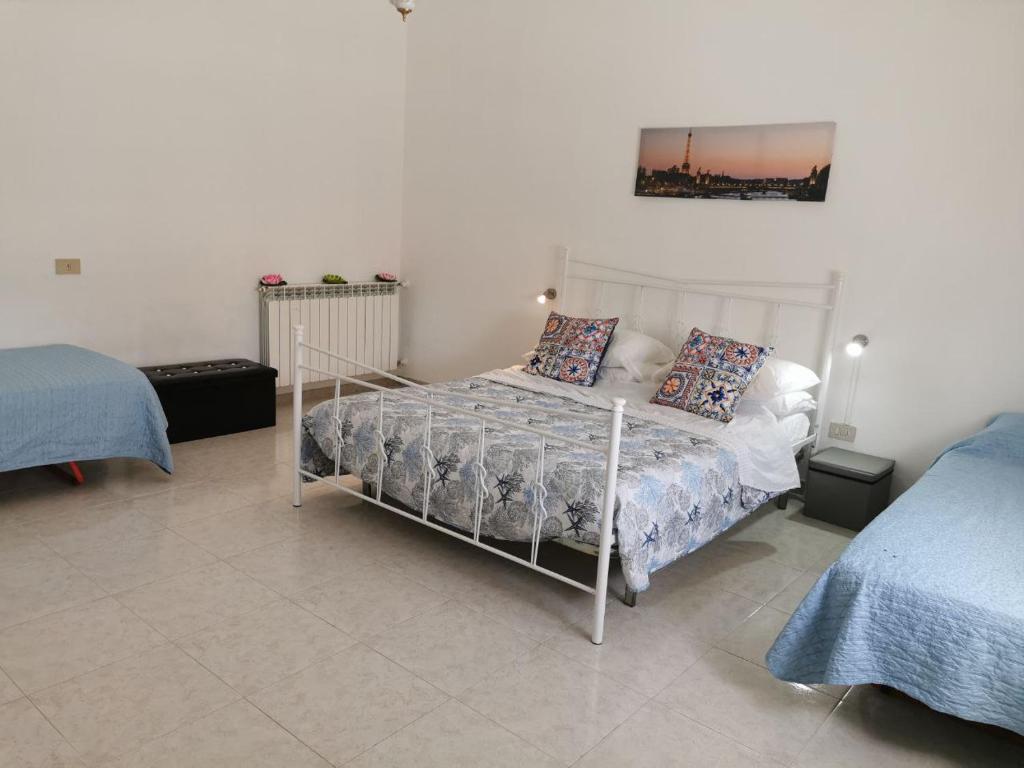Posteľ alebo postele v izbe v ubytovaní Casa BiaBella
