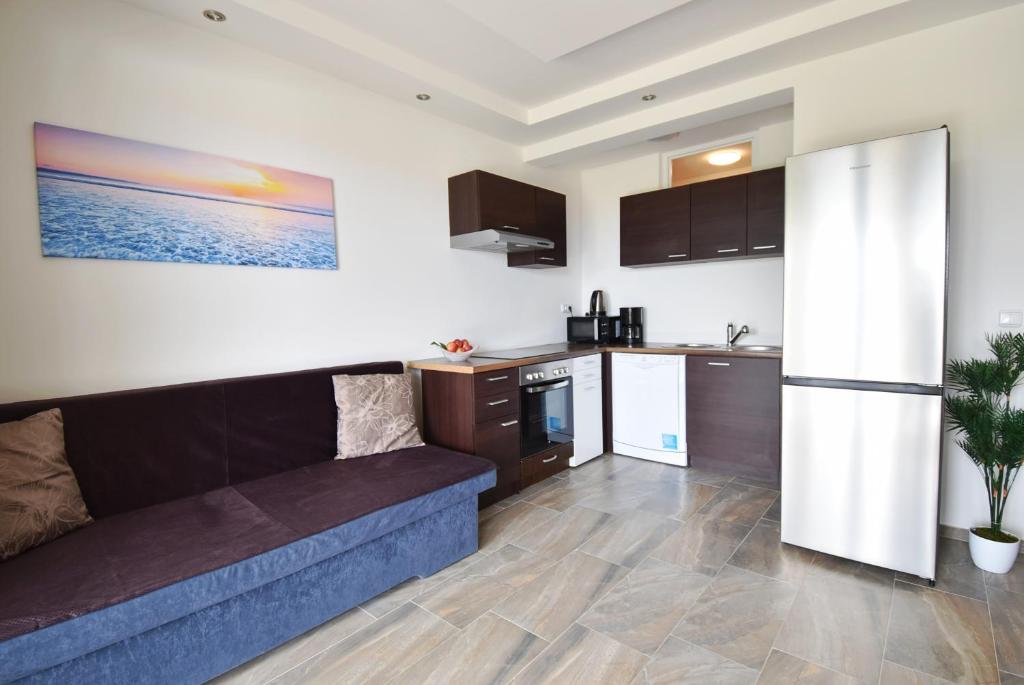 Kuchyňa alebo kuchynka v ubytovaní Apartmani Solis