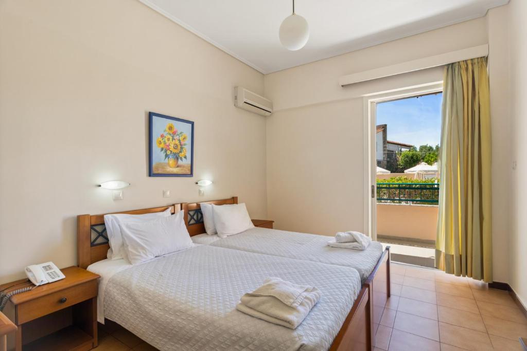 Posteľ alebo postele v izbe v ubytovaní Lefktron Hotel