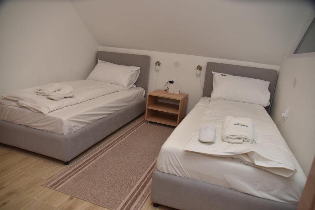 Postel nebo postele na pokoji v ubytování Vila Lux Nedeljkovic Gornja Trepca