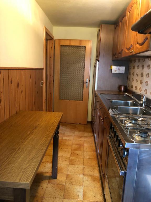 A kitchen or kitchenette at Case vacanze Desiree