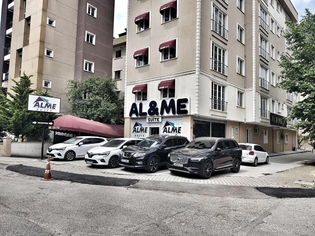 a group of cars parked in front of a building at Alme Sui̇te in Istanbul