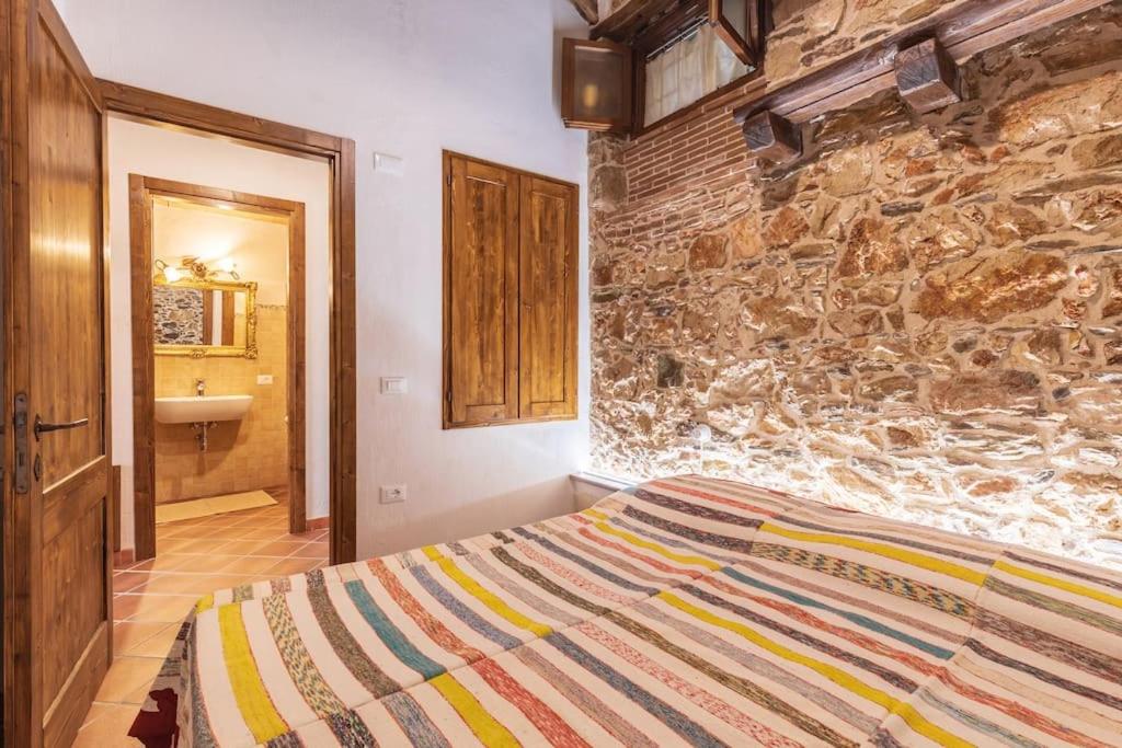Postel nebo postele na pokoji v ubytování Domm'e Antoni