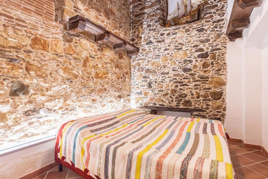 Postel nebo postele na pokoji v ubytování Domm'e Antoni
