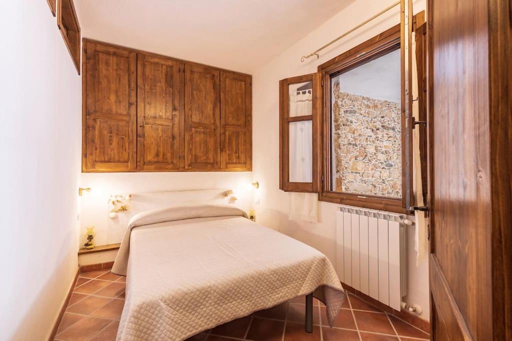 Postel nebo postele na pokoji v ubytování Domm'e Antoni