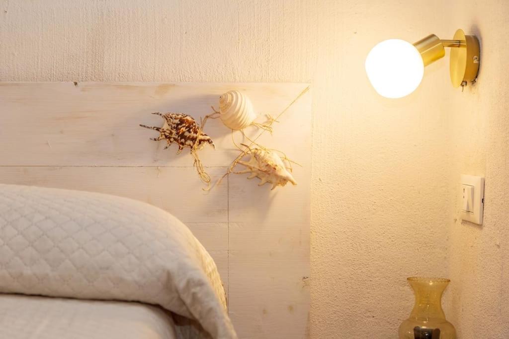 Postel nebo postele na pokoji v ubytování Domm'e Antoni