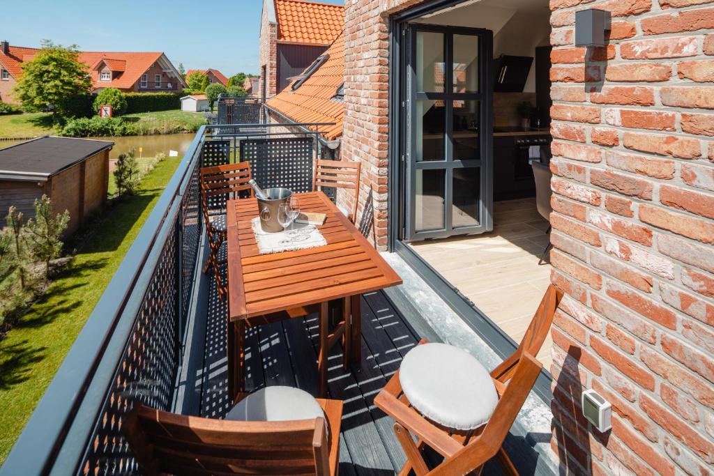 Balkón nebo terasa v ubytování Küsten Suite West seitliche Wasserlage, 1 Balkon, 90qm