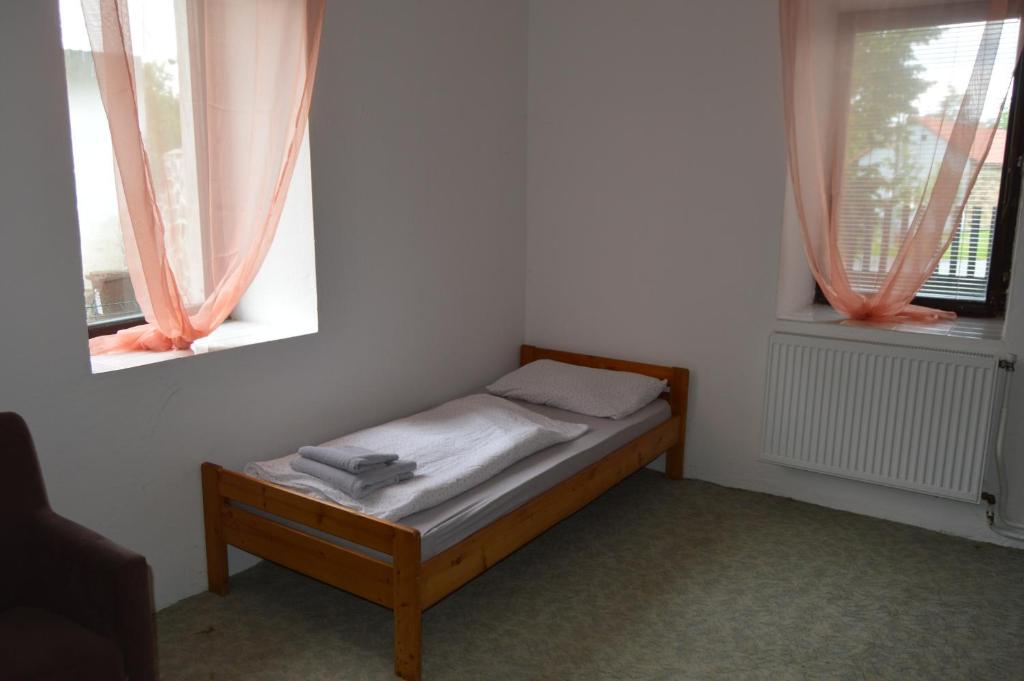 Postel nebo postele na pokoji v ubytování Bohemica Apartman 1