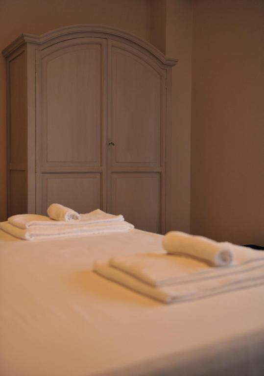 Łóżko lub łóżka w pokoju w obiekcie Vatican Holiday Home