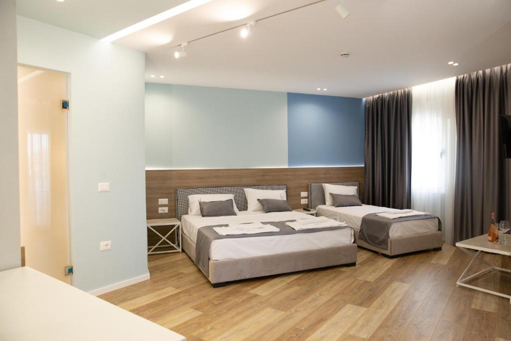 Letto o letti in una camera di Veranda Boutique Hotel