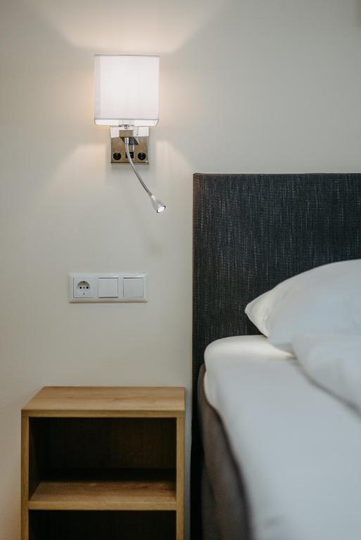 Posteľ alebo postele v izbe v ubytovaní Chill & Relax Apartments in Neusiedl am See