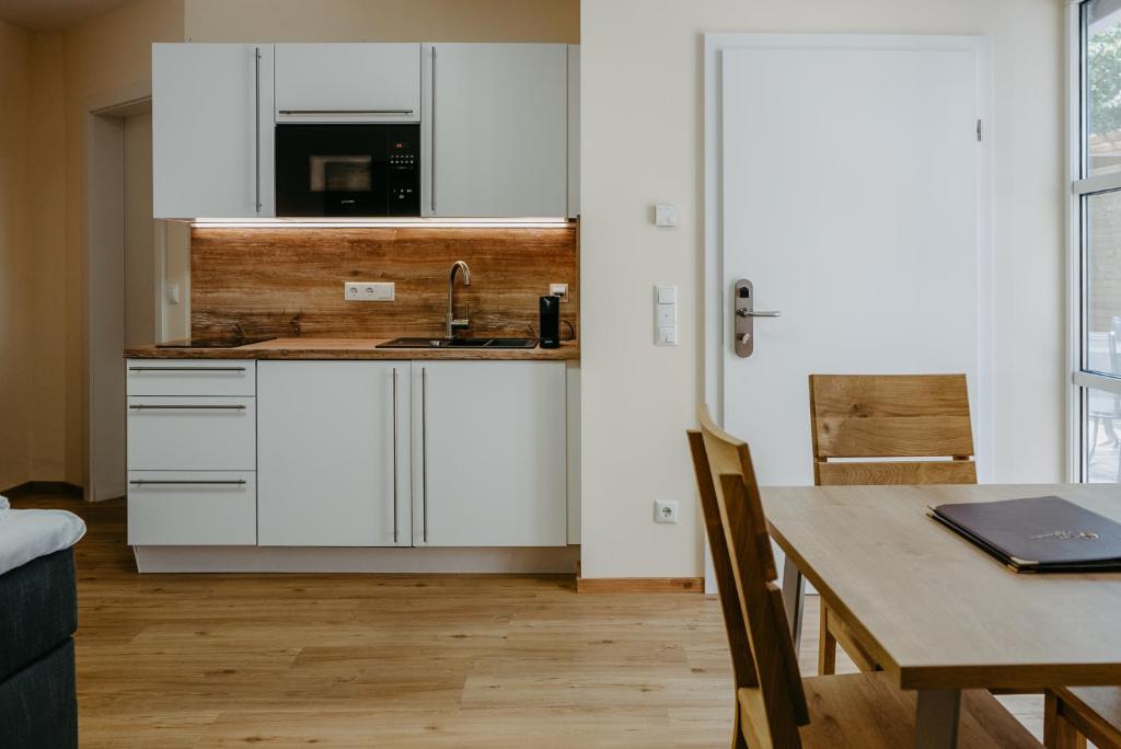 Kuchyňa alebo kuchynka v ubytovaní Chill & Relax Apartments in Neusiedl am See