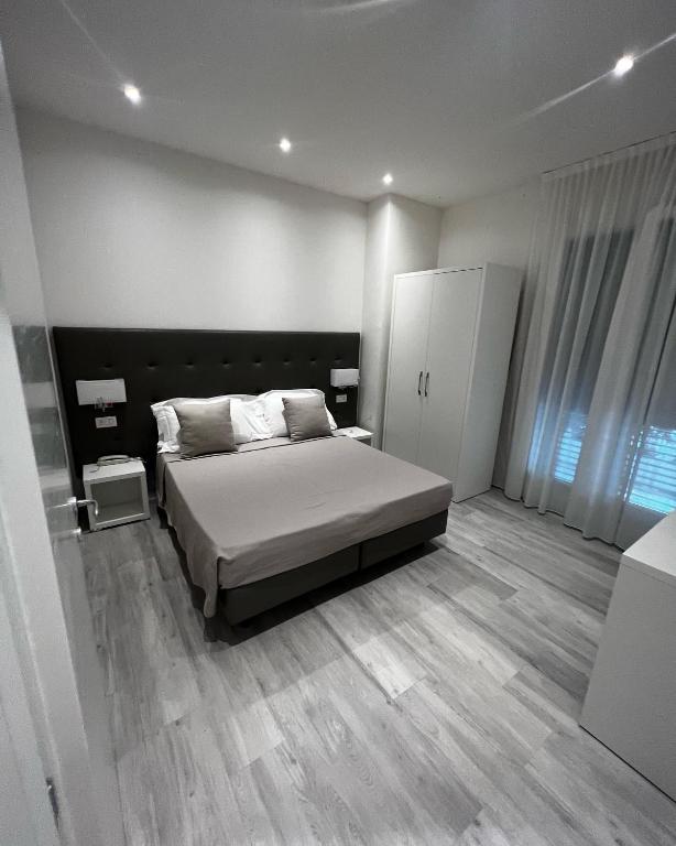 Postel nebo postele na pokoji v ubytování Hotel Ardea