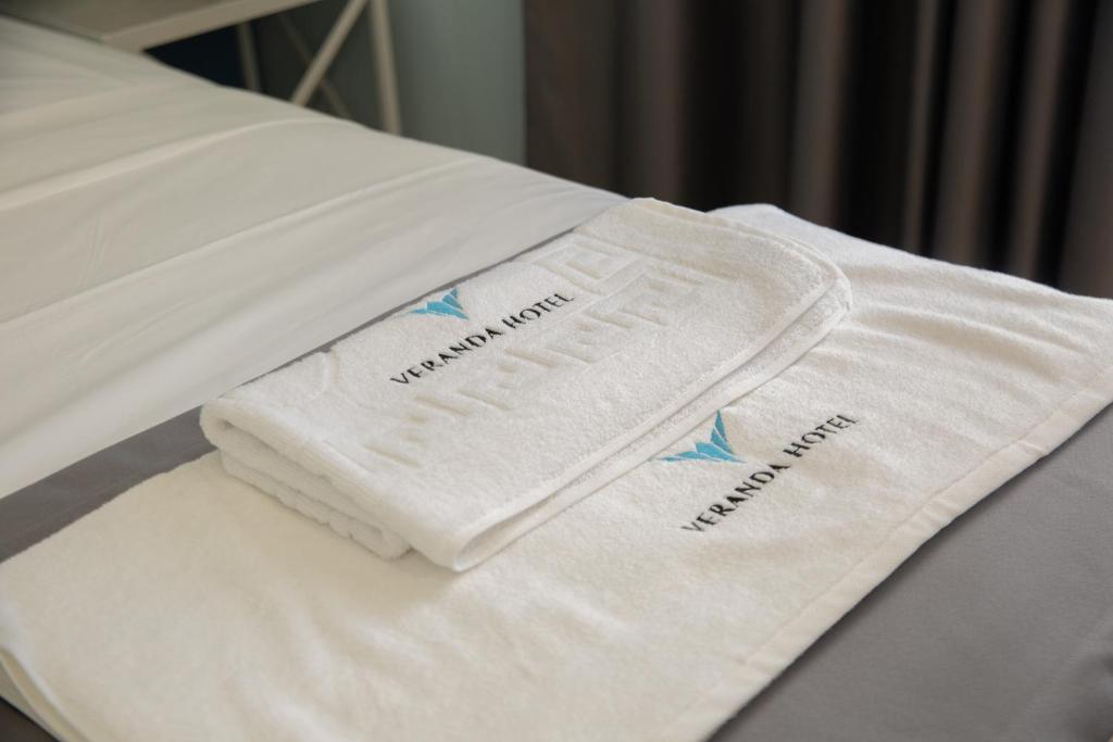 Letto o letti in una camera di Veranda Boutique Hotel