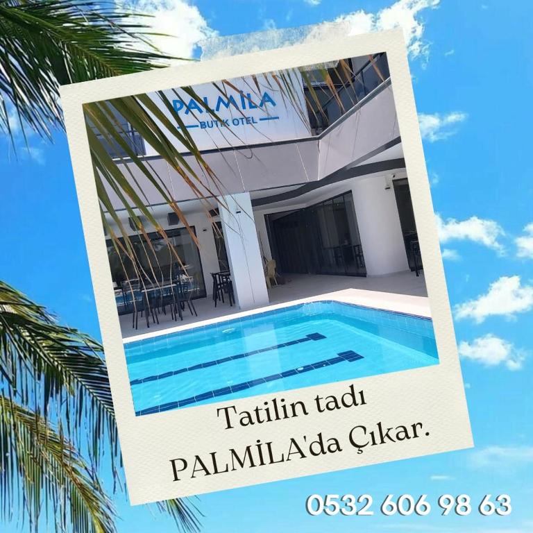 בריכת השחייה שנמצאת ב-PALMİLA BUTİK OTEL או באזור