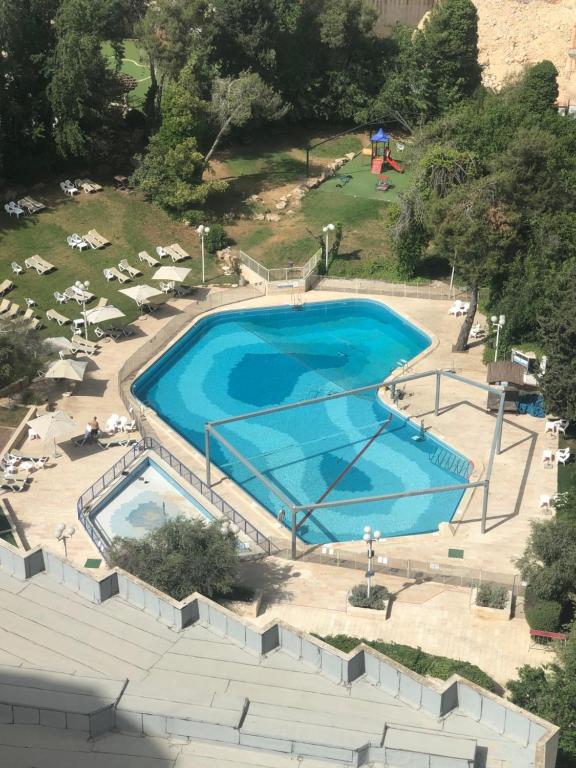 an overhead view of a large swimming pool at Jerusalem Hotel Private Luxury Suites near Western Wall in Jerusalem